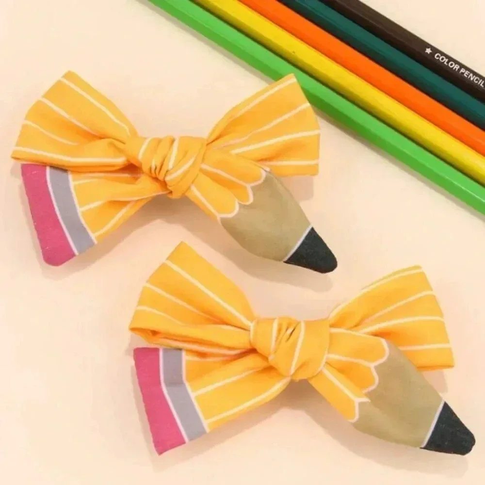Yellow pink and white pencil ribbon bow barrettes back to school ponytail holder